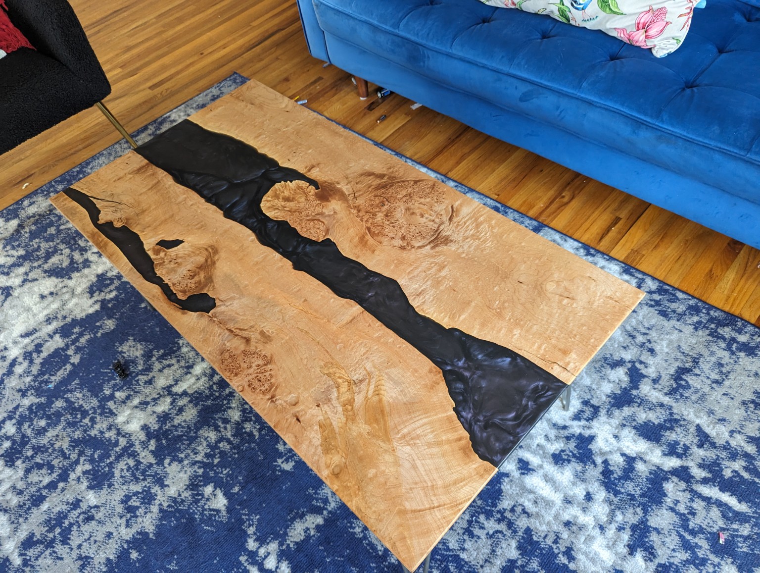 Burl wood coffee table with black resin