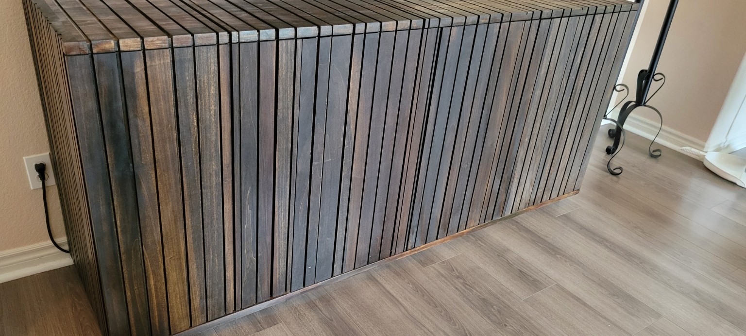 Custom dark slatted wood cabinet